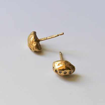 diamond gold studs pictured on white. Handmade fine jewellery by Madeleine.