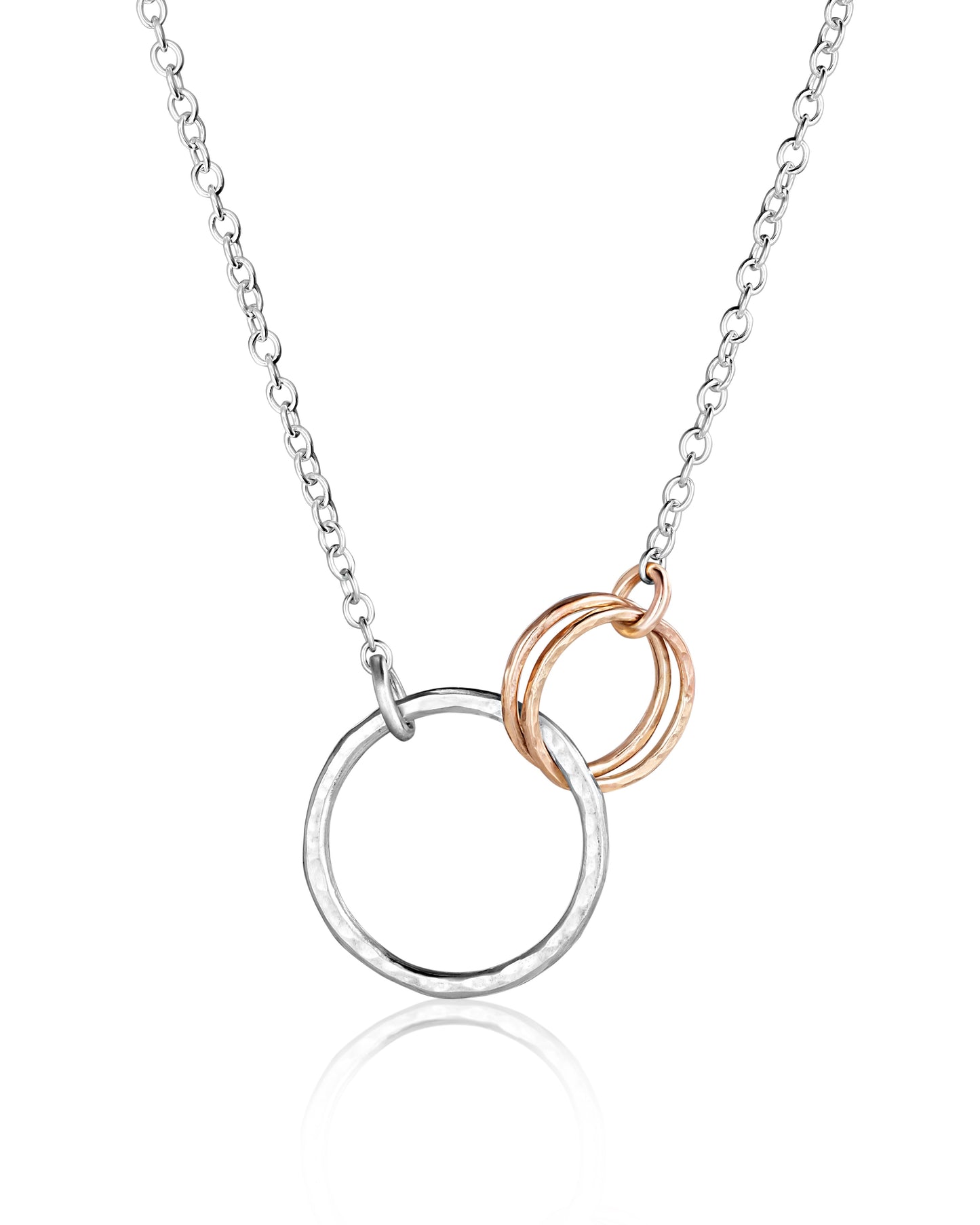 gold and silver circle necklace picture on a white background.